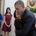 Obama Uses Hugs, Kisses to Ease Ebola Fears